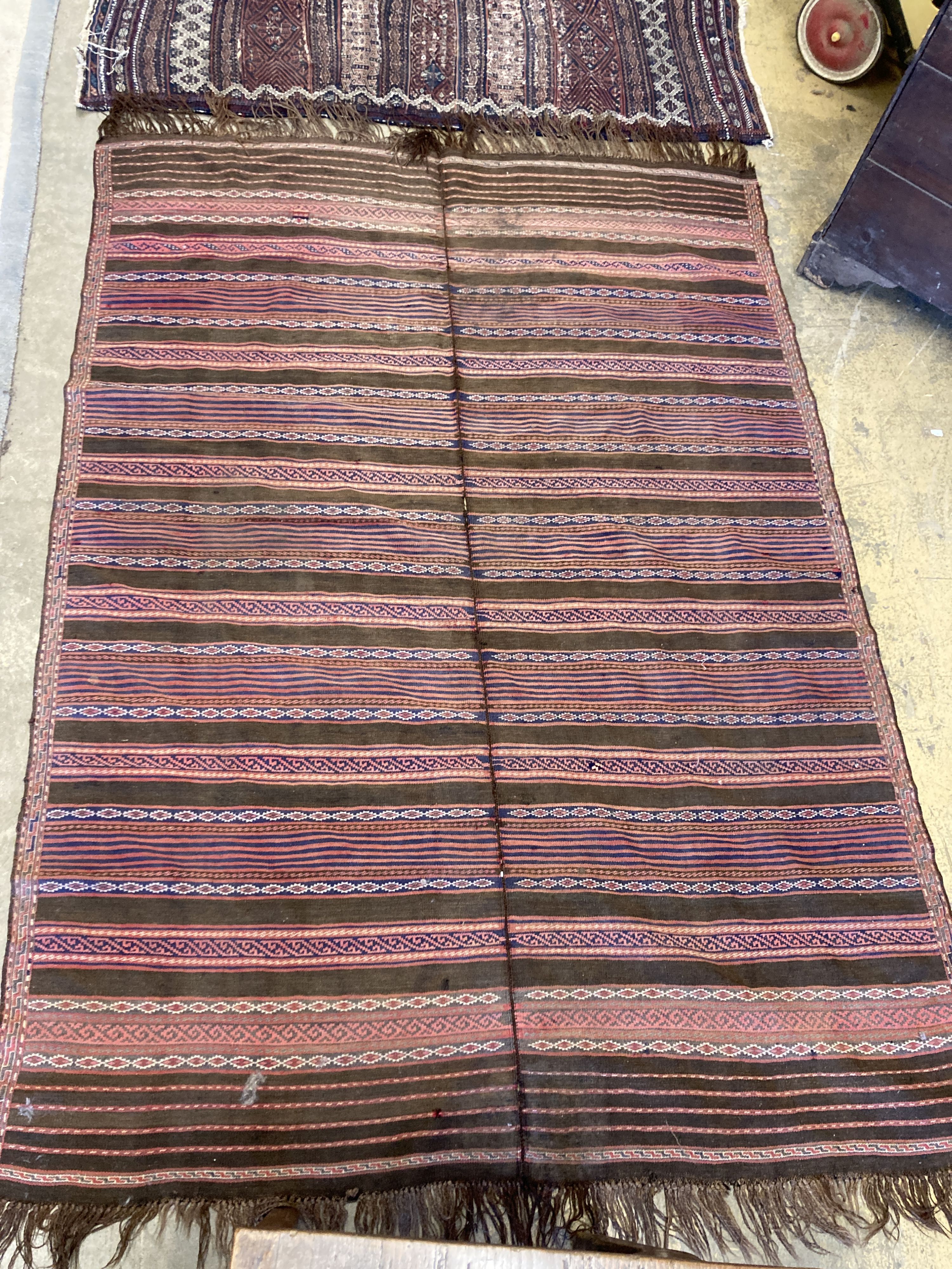 Two early 20th century flatweave rugs, a Bokhara rug and a Belouch rug, largest 220 x 160cm